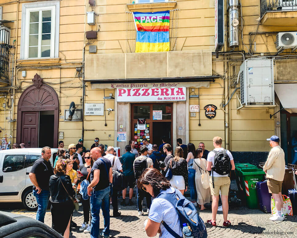 Queue outside L'Antica Pizzeria da Michele in Naples, Italy