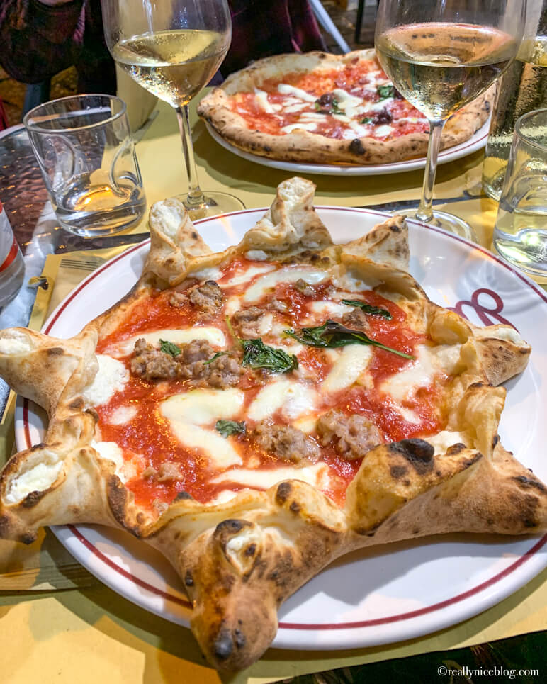 Star-shaped pizza filled with fresh ricotta at Da Attilio